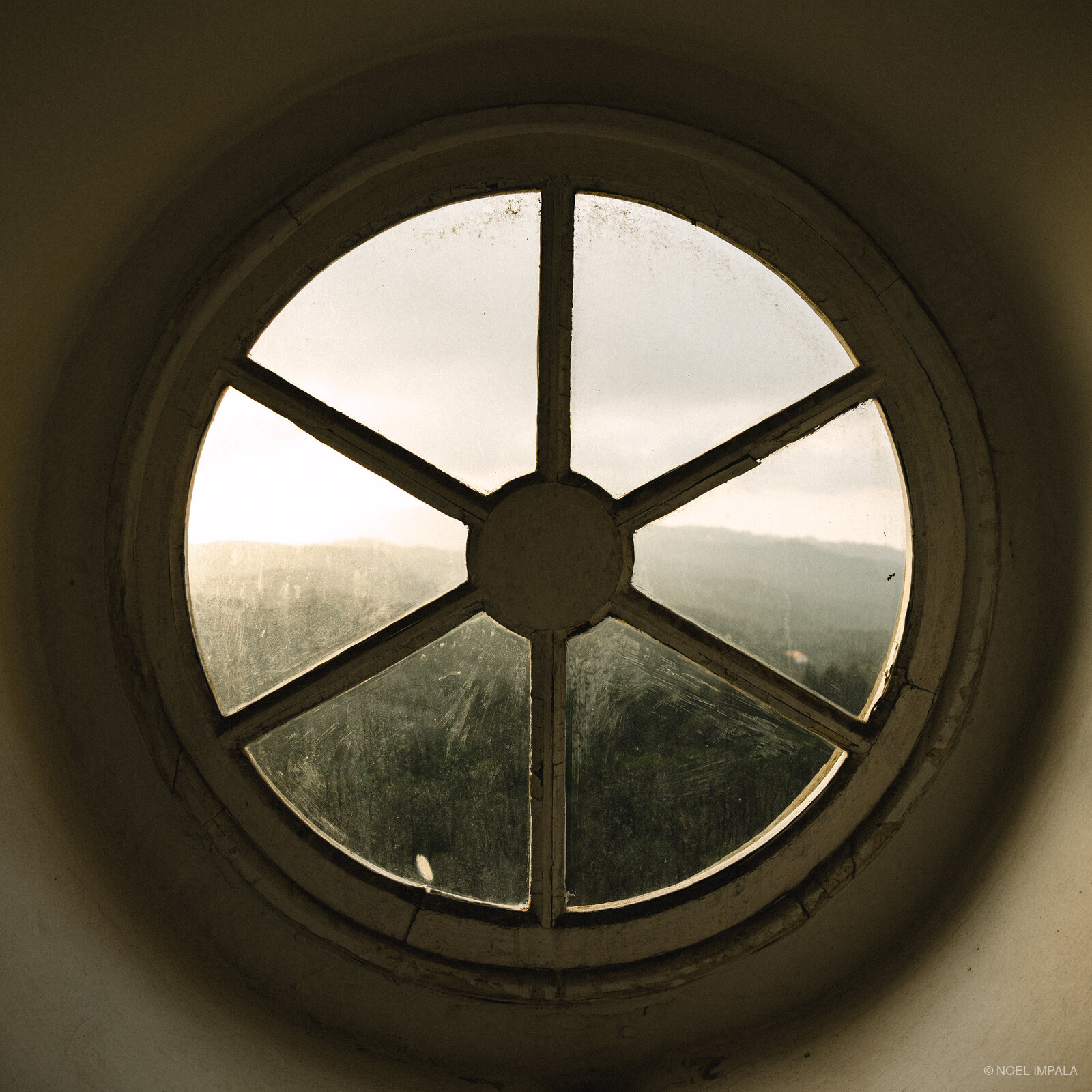 Circular window misty landscape