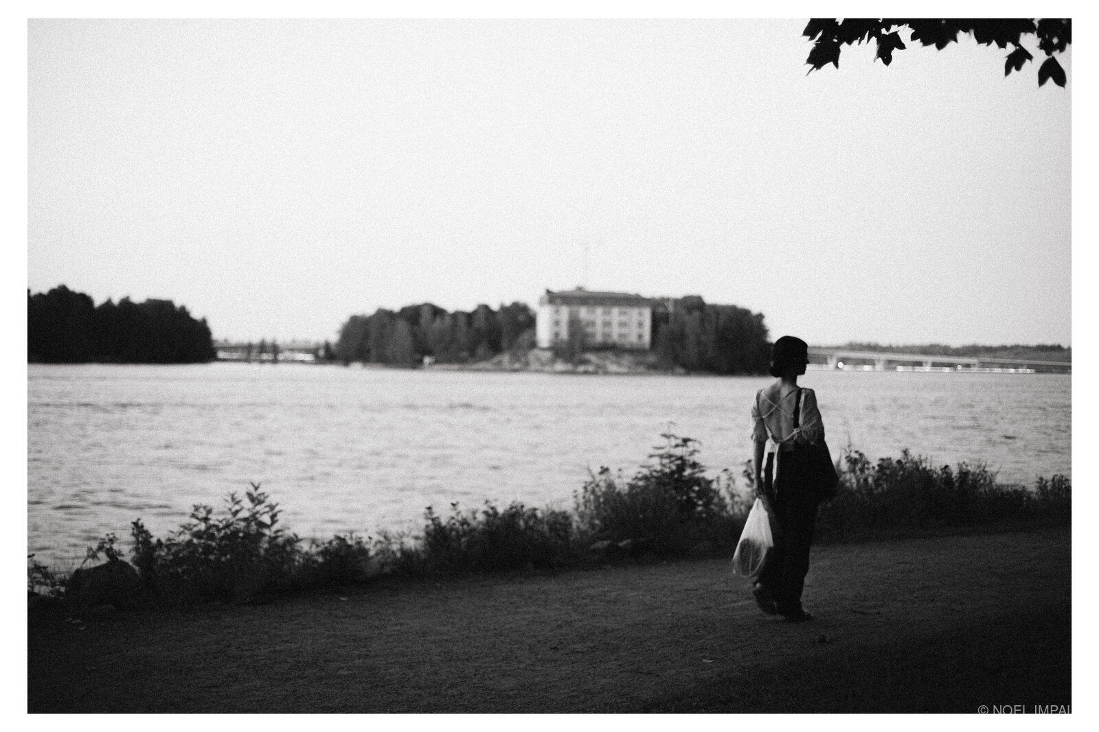 Woman walking by Helsinki waterfront