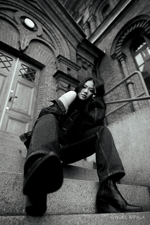 Woman sitting on steps