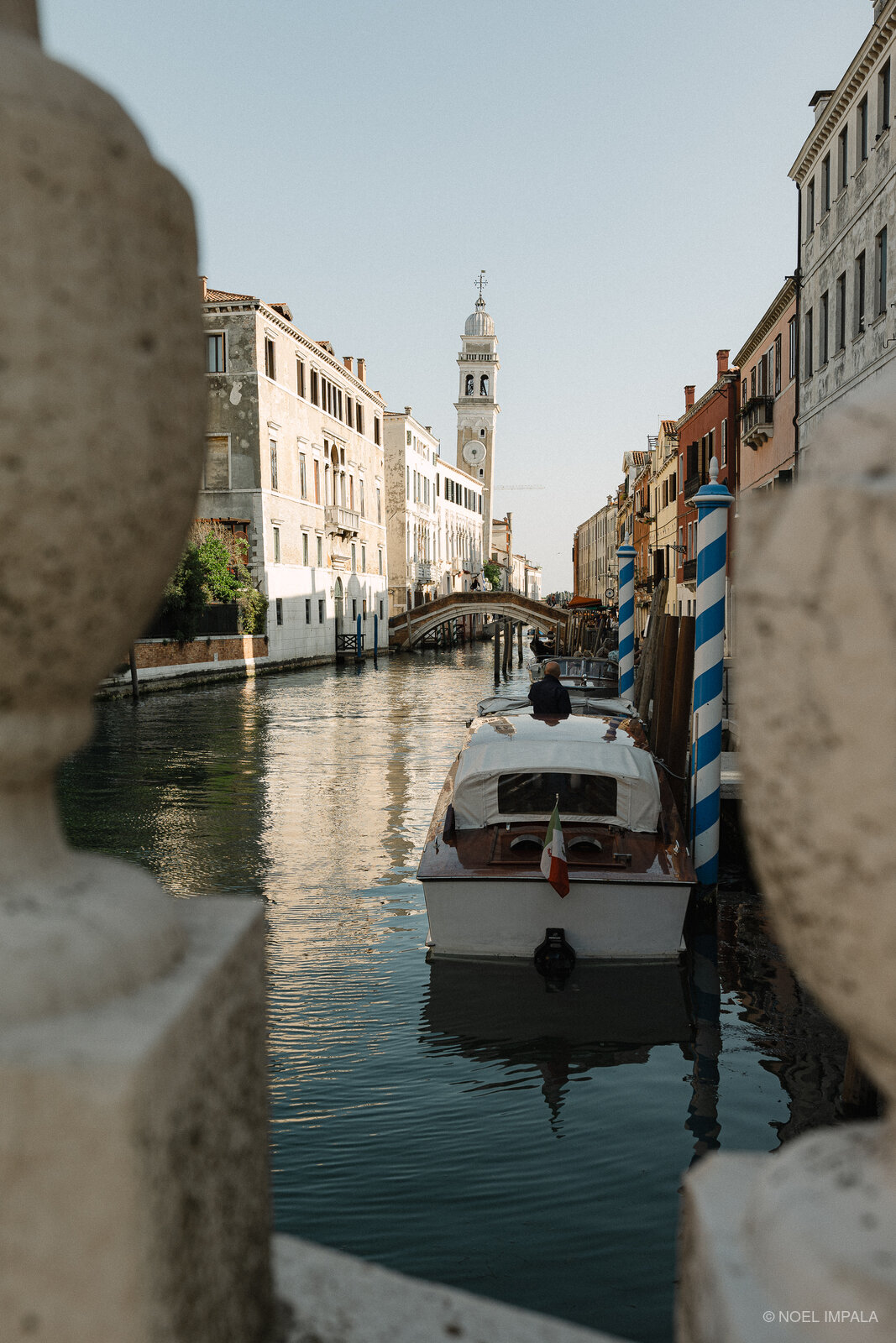Boat toward Venice bell tower